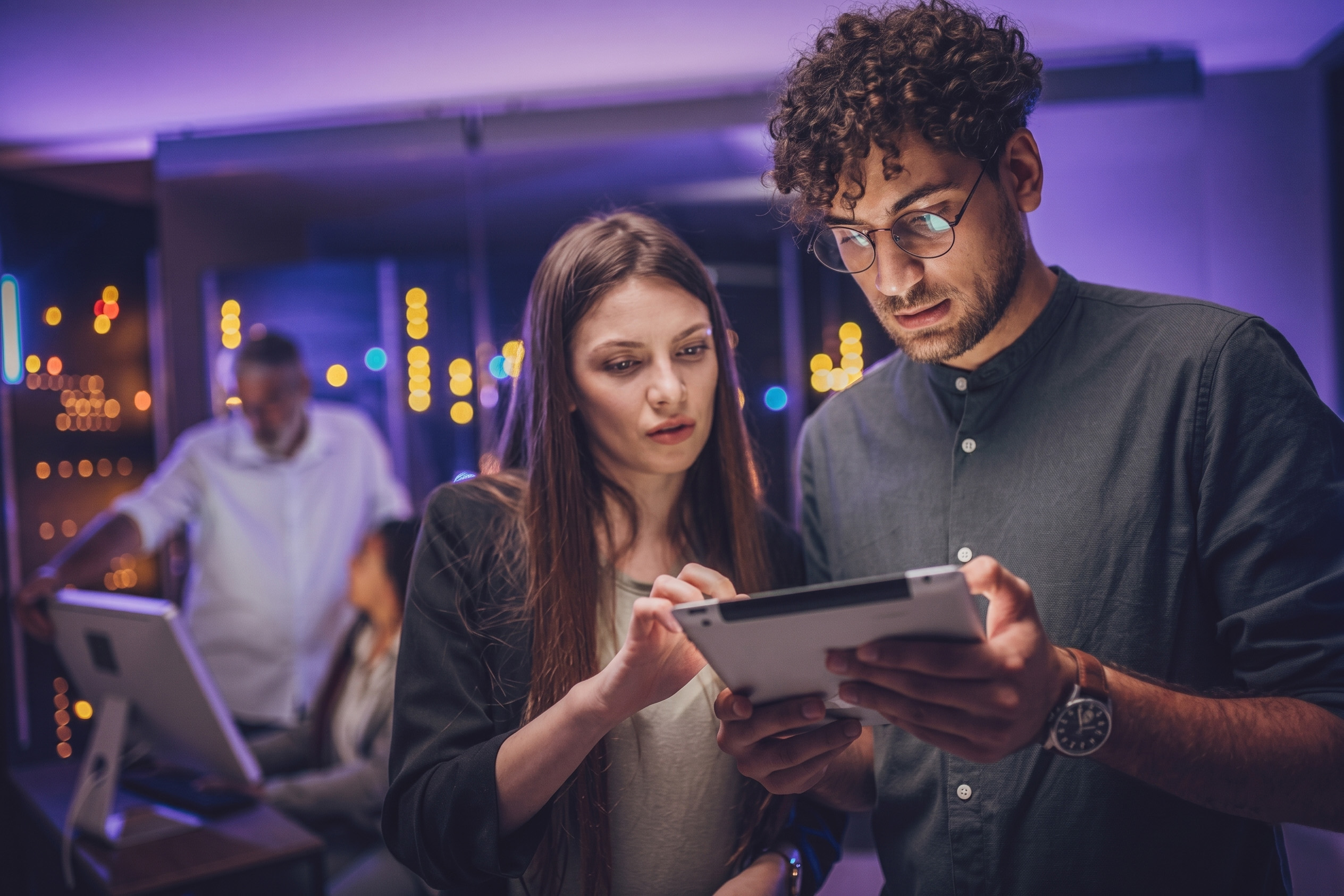 IT executives auditing server hardware to translate cyber risk into financial resilience and verify enterprise backup security.
